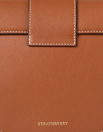 Fabric image thumbnail - Strathberry - Crescent Tan Leather Crossbody Bag