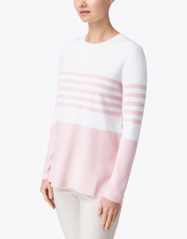 white and pink sweater