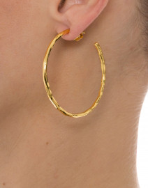 Look image thumbnail - Nest - Gold Thin Hammered Hoop Earrings